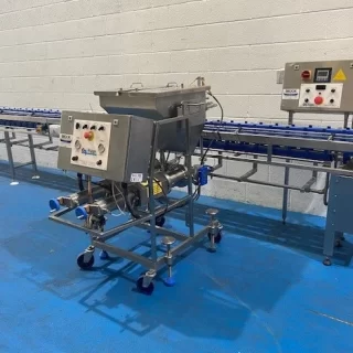Model 1000 Twin Track Indexing + Depositing Line