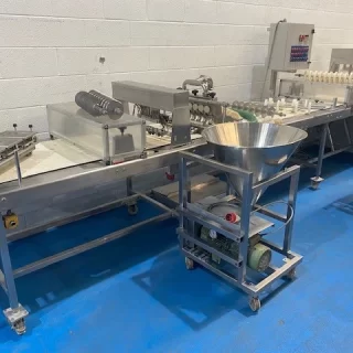 23 ft Pastry Make Up Line with Sausage Meat Pump – 3 head piston depositor – top feed conveyor – qty of tools